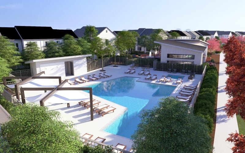a swimming pool with chairs around it