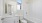 bathroom with toilet near shower and sink